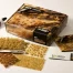 Vorderseite der Packung Gamers Grass Grass Tuft Starter Box Dry Grass mit beigefarbenen Grasbüscheln