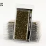 Vorderseite der Packung Gamers Grass Dark Moss 2 mm mit dunkelgrünen Grasbüscheln