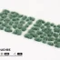 Nahaufnahme der leuchtend türkisen Grasbüschel Gamers Grass Alien Turquoise 6 mm auf Sci-Fi-Dioramen