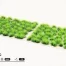 Nahaufnahme der leuchtend giftgrünen Grasbüschel Gamers Grass Alien Toxic 6 mm auf Sci-Fi-Dioramen